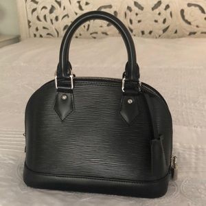 LV Alma BB Epi leather in black.